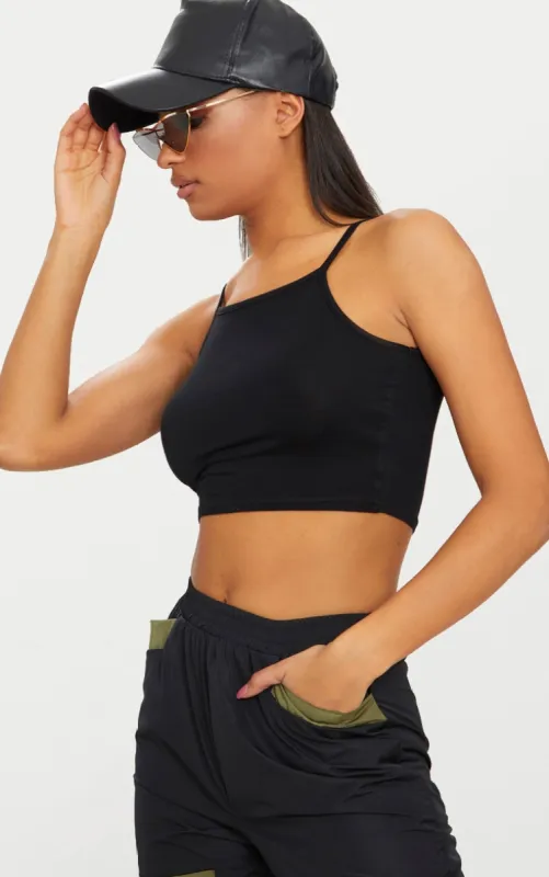 Basic Black Cotton Blend Racer Neck Crop Top sold by Pretty Little Thing