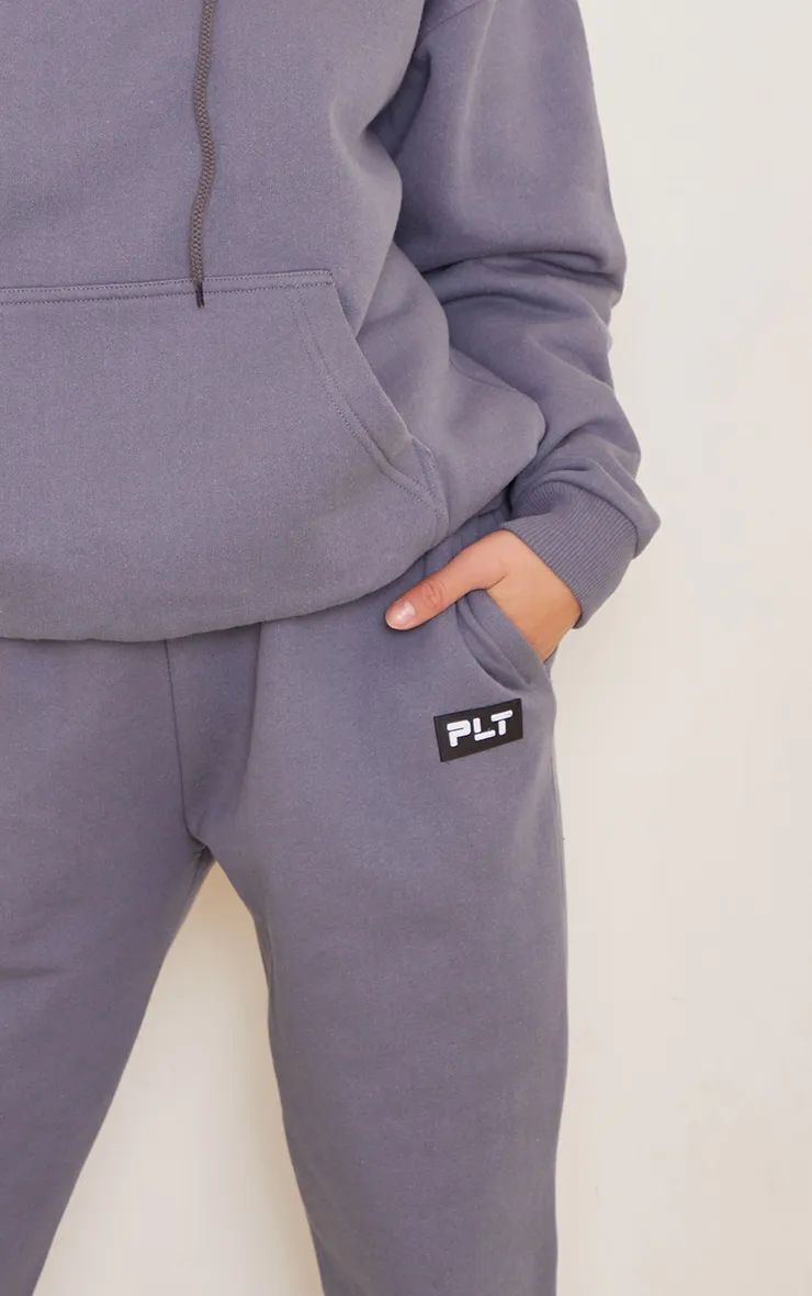 PRETTYLITTLETHING Petite Charcoal Badge Detail Straight Leg Joggers sold by Pretty Little Thing product image thumbnail 4