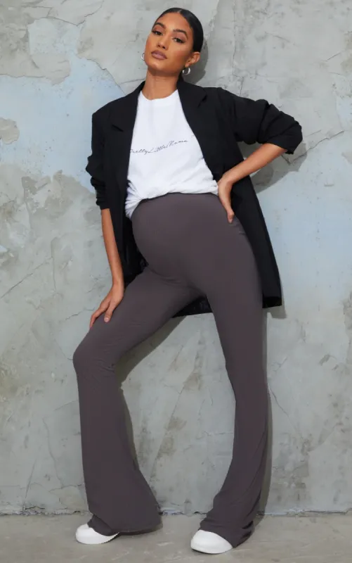 Maternity Slate Ribbed Flared Leggings sold by Pretty Little Thing