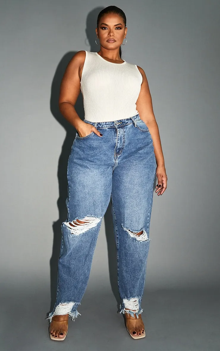 PRETTYLITTLETHING Plus Mid Blue Extreme Ripped Hem Knee Rip Mom Jeans sold by Pretty Little Thing