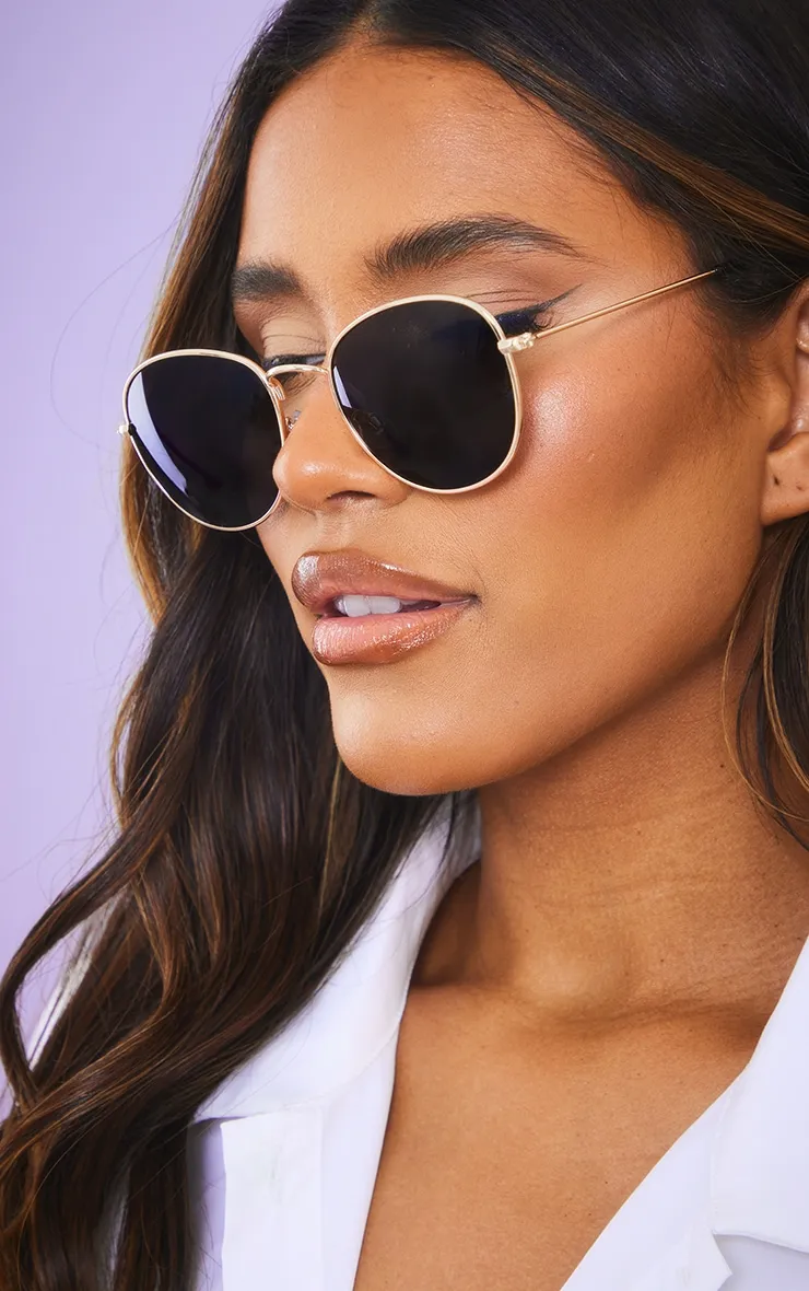 Black On Gold Circular Sunglasses sold by Pretty Little Thing