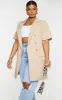 Plus Cream Woven Short Sleeve Longline Blazer sold by Pretty Little Thing
