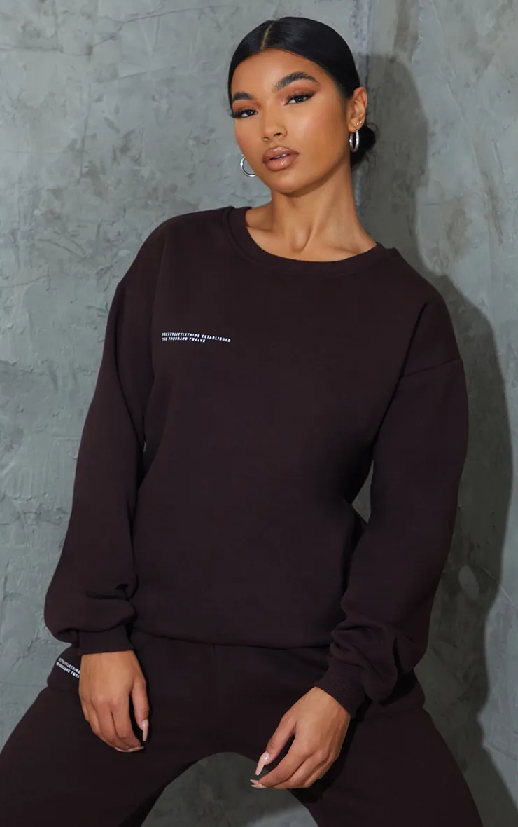 PRETTYLITTLETHING Chocolate Brown Est 2012 Oversized Sweatshirt sold by Pretty Little Thing