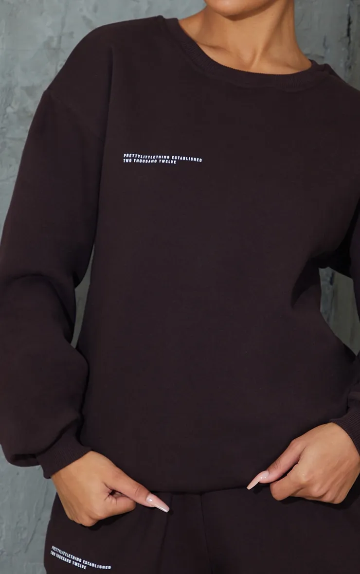 PRETTYLITTLETHING Chocolate Brown Est 2012 Oversized Sweatshirt sold by Pretty Little Thing product image thumbnail 4