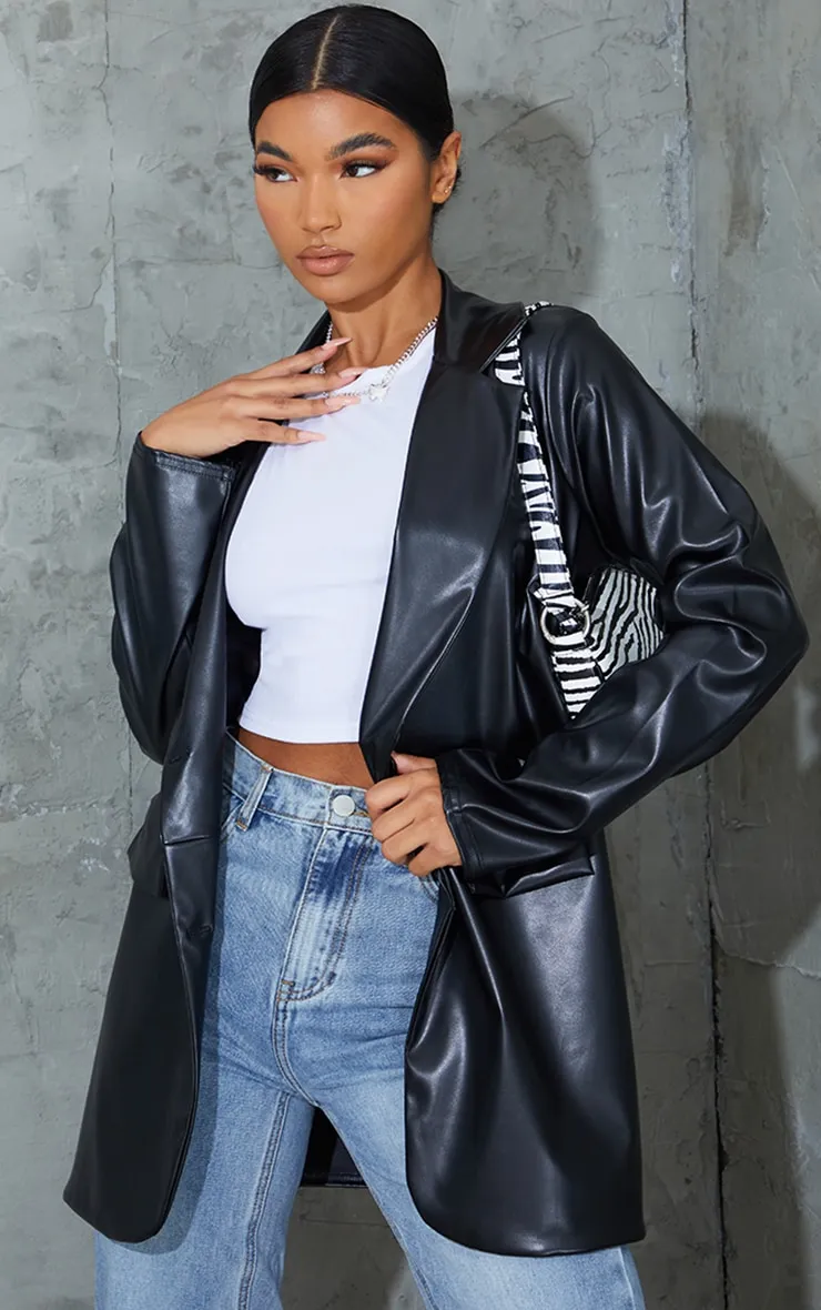 Black PU Pocket Look Double Button Blazer sold by Pretty Little Thing