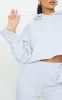 Grey Oversized Turn Up Sleeve Hem Cropped Sweatshirt sold by Pretty Little Thing