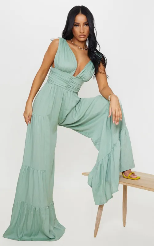 Sage Green Linen Look Plunge Tiered Wide Leg Jumpsuit sold by Pretty Little Thing