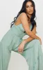 Sage Green Linen Look Plunge Tiered Wide Leg Jumpsuit sold by Pretty Little Thing