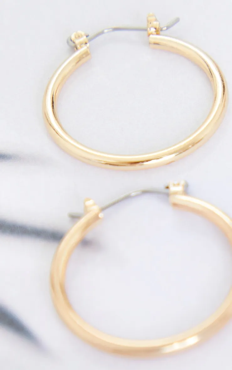 Gold Mini Hoop Earrings sold by Pretty Little Thing product image thumbnail 3