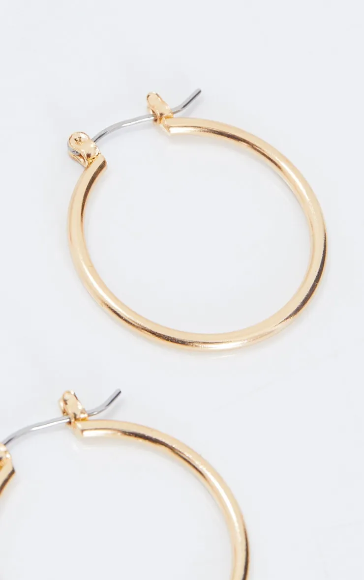 Gold Mini Hoop Earrings sold by Pretty Little Thing product image thumbnail 4