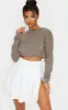 White Pleated Side Split Tennis Skirt sold by Pretty Little Thing