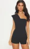 Black Drape One Shoulder Playsuit sold by Pretty Little Thing
