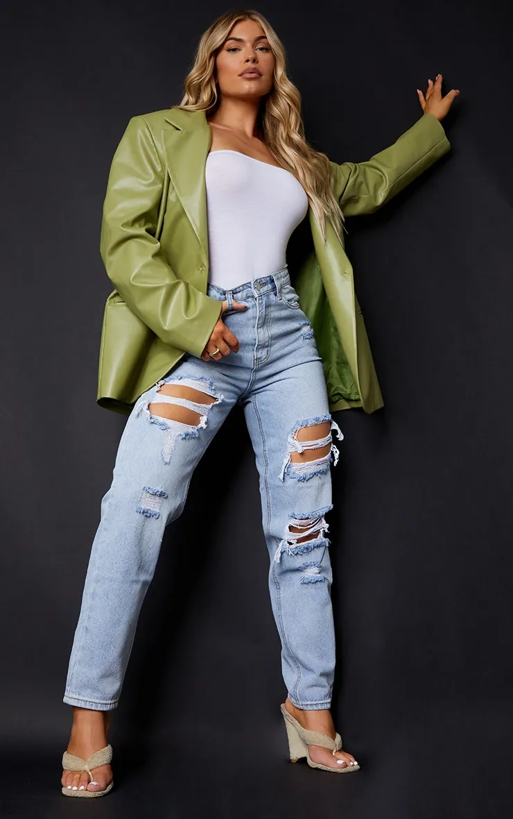 PRETTYLITTLETHING Light Wash Ripped Mom Jeans sold by Pretty Little Thing