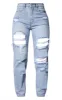 PRETTYLITTLETHING Light Wash Ripped Mom Jeans sold by Pretty Little Thing