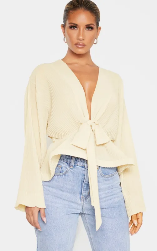 Cream Chiffon Pleated Flounced Hem Blouse sold by Pretty Little Thing