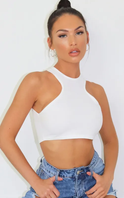 White Crepe Racer Neck Crop Top sold by Pretty Little Thing