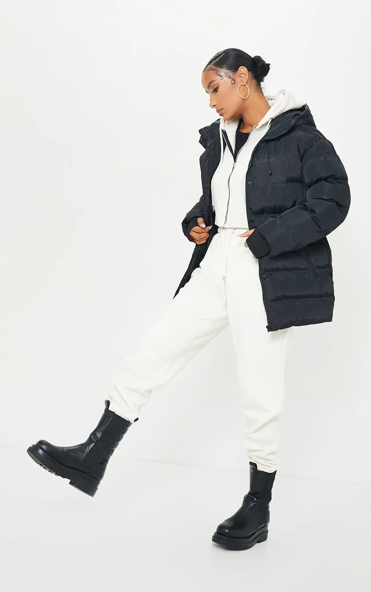 Black Quilted Belted Cuffed Sleeve Puffer Coat. sold by Pretty Little Thing product image thumbnail 3