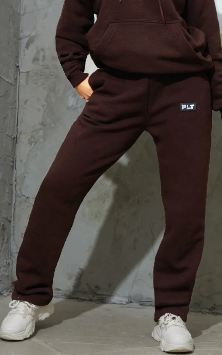 PRETTYLITTLETHING Petite Chocolate Badge Detail Straight Leg Joggers sold by Pretty Little Thing product image thumbnail 2