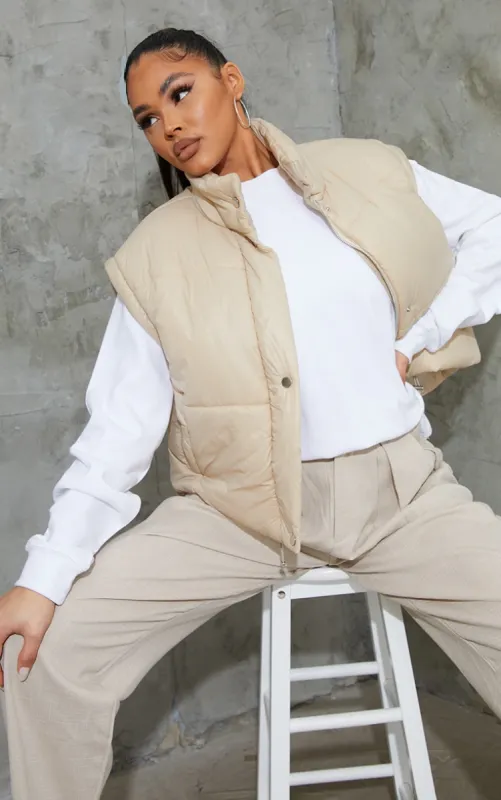 Cream Detachable Arm Gilet Puffer Jacket sold by Pretty Little Thing