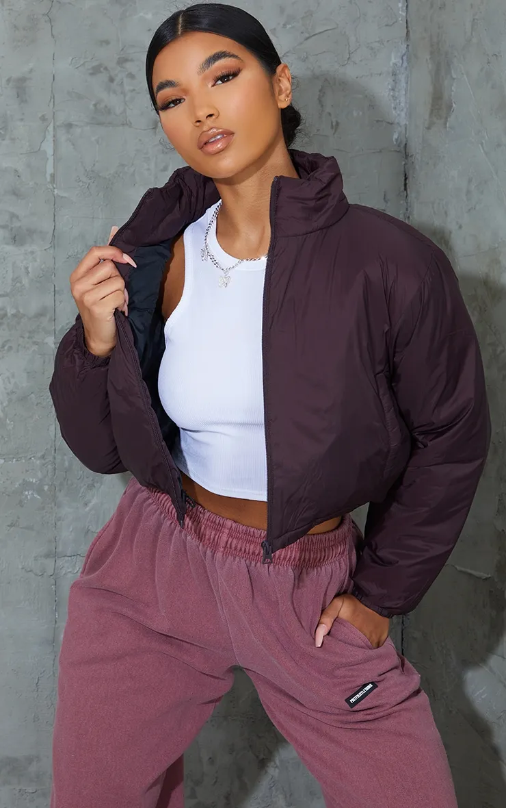Burgundy Basic Cropped Toggle Hem Puffer sold by Pretty Little Thing