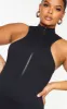 Plus Black Structured Contour Rib High Neck Unitard sold by Pretty Little Thing