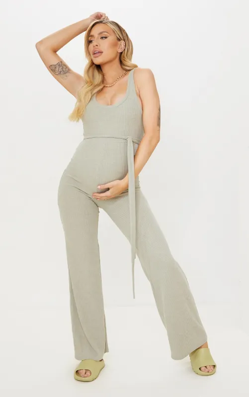 Maternity Sage Ribbed Tie Waist Jumpsuit sold by Pretty Little Thing