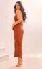 Chocolate Halterneck Knot Detail Slit Maxi Dress sold by Pretty Little Thing