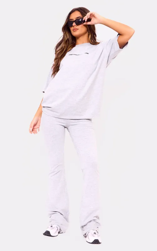 PRETTYLITTLETHING Ash Grey Print Flared Trouser sold by Pretty Little Thing