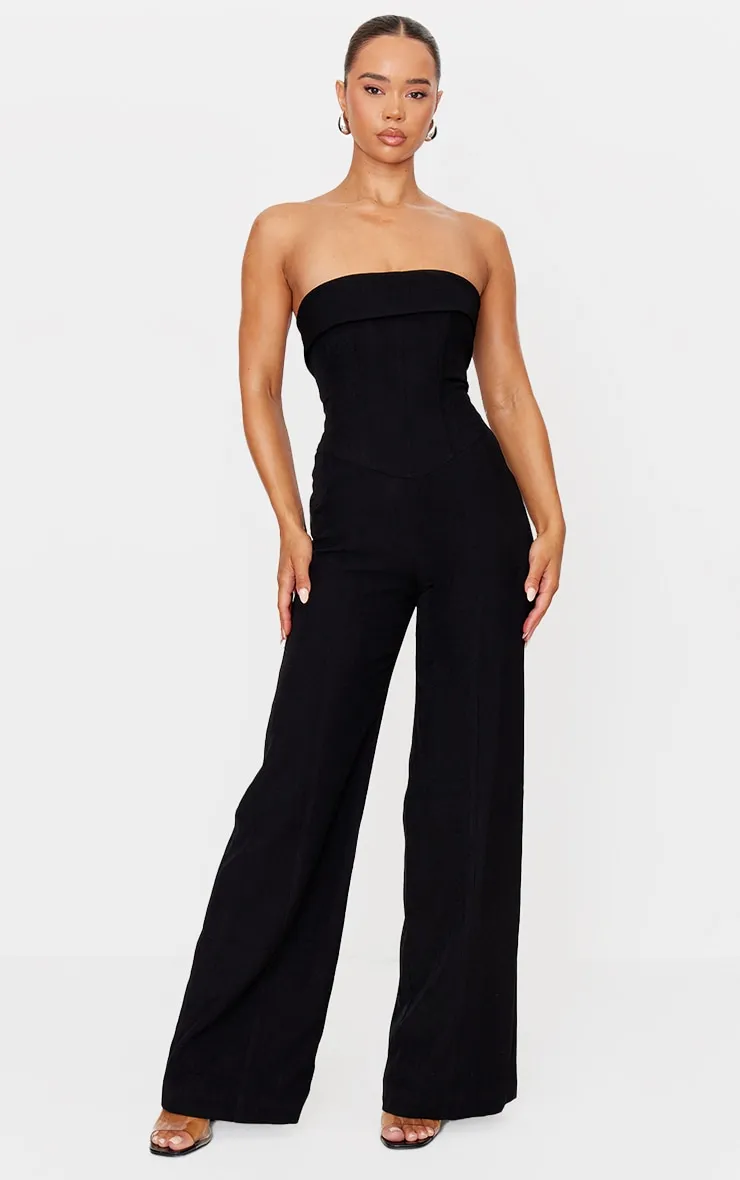 Premium Black Woven Bandeau Corset Straight Leg Jumpsuit sold by Pretty Little Thing