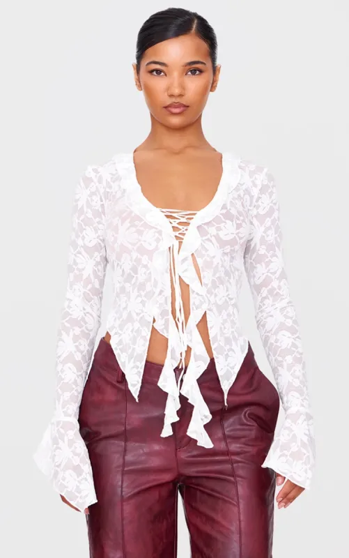Lace Tie Front Ruffle Blouse sold by Pretty Little Thing