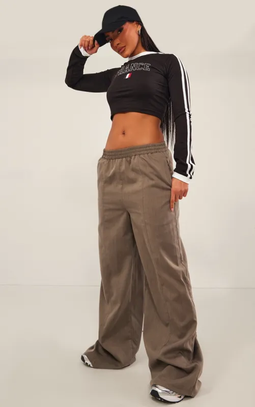 Khaki Marl Woven Pintuck Elasticated Waist Trousers sold by Pretty Little Thing