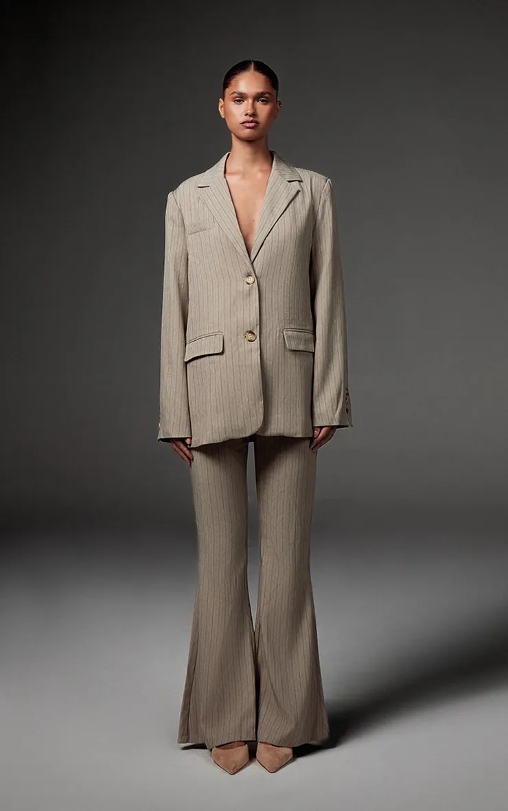 Grey Tailored Woven Pinstripe Slim Flare Trousers sold by Pretty Little Thing