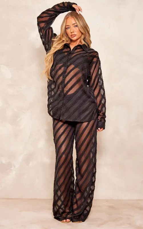 Black Textured Chiffon Oversized Wide Leg Trousers sold by Pretty Little Thing