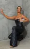Black PU Strappy Split Hem Flared Jumpsuit sold by Pretty Little Thing