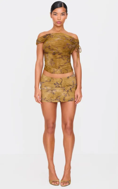 Olive Floral Devore Low Rise Mini Skirt made by Pretty Little Thing