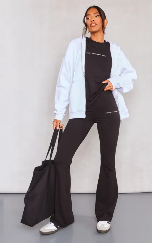 PRETTYLITTLETHING Black Printed Flared Trousers sold by Pretty Little Thing