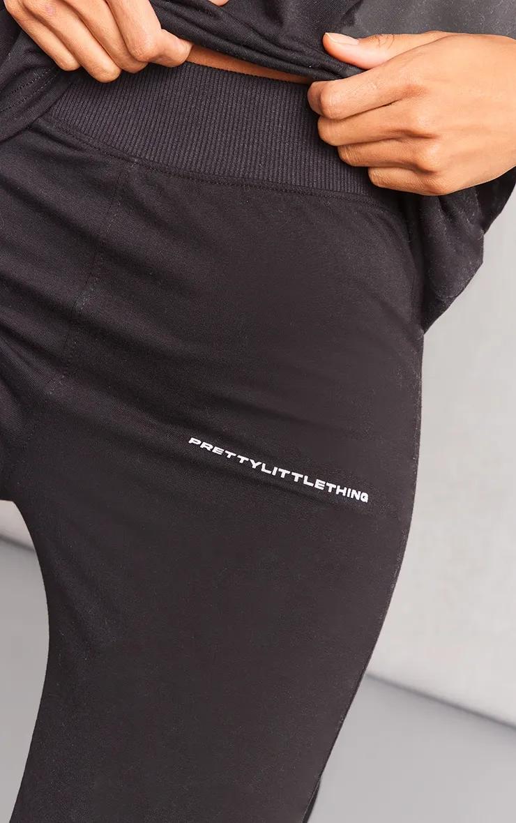 PRETTYLITTLETHING Black Printed Flared Trousers sold by Pretty Little Thing product image thumbnail 4