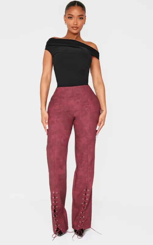 Shape Burgundy Faux Leather Lace Up Flare Trousers sold by Pretty Little Thing
