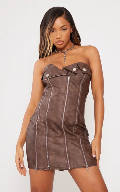 Brown Faux Leather Zip Detail Mini Dress sold by Pretty Little Thing
