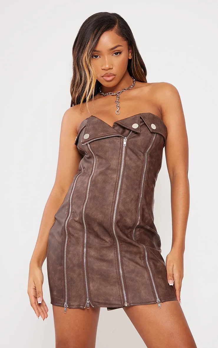 Brown Faux Leather Zip Detail Mini Dress sold by Pretty Little Thing