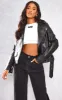 Tall Black Faux Leather Zip Detail Biker Jacket sold by Pretty Little Thing