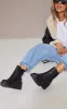 Black Wide Fit PU Chunky Chelsea Ankle Boots sold by Pretty Little Thing
