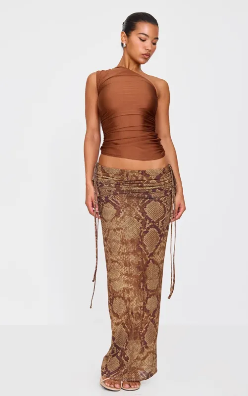 Brown Snake Print Ruched Side Maxi Skirt sold by Pretty Little Thing