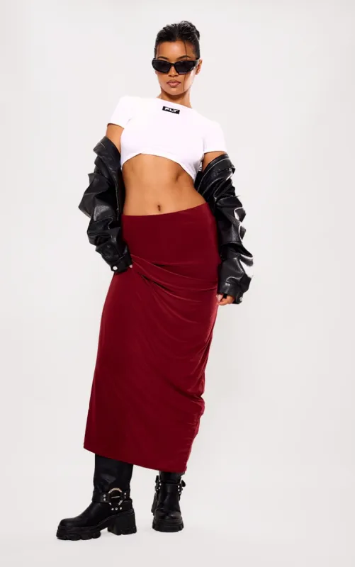 Burgundy Soft Touch Low Rise Drapy Maxi Skirt sold by Pretty Little Thing
