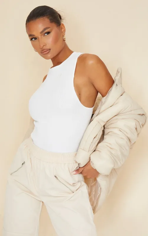 White Structured Contour Racer Neck Ribbed Bodysuit sold by Pretty Little Thing