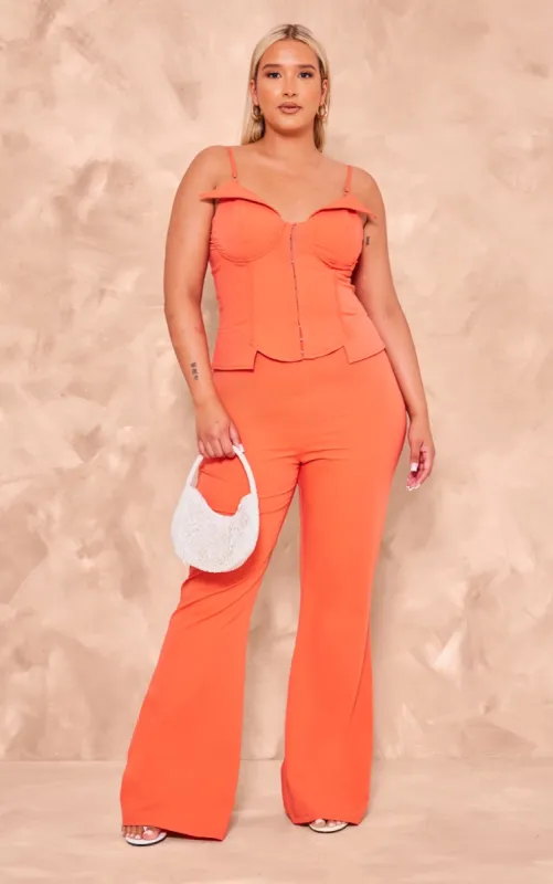 Plus Deep Orange Wide Leg Trousers sold by Pretty Little Thing