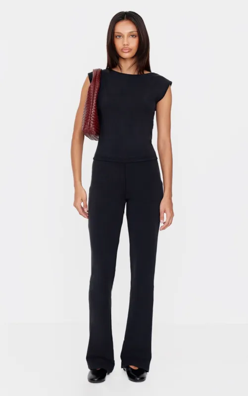 Black Premium Soft Touch Skinny Flare Trousers sold by Pretty Little Thing
