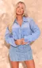 Mid Blue Wash Upside Down Waistband Crop Denim Jacket sold by Pretty Little Thing