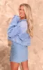 Mid Blue Wash Upside Down Waistband Crop Denim Jacket sold by Pretty Little Thing