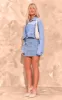 Mid Blue Wash Upside Down Waistband Crop Denim Jacket sold by Pretty Little Thing